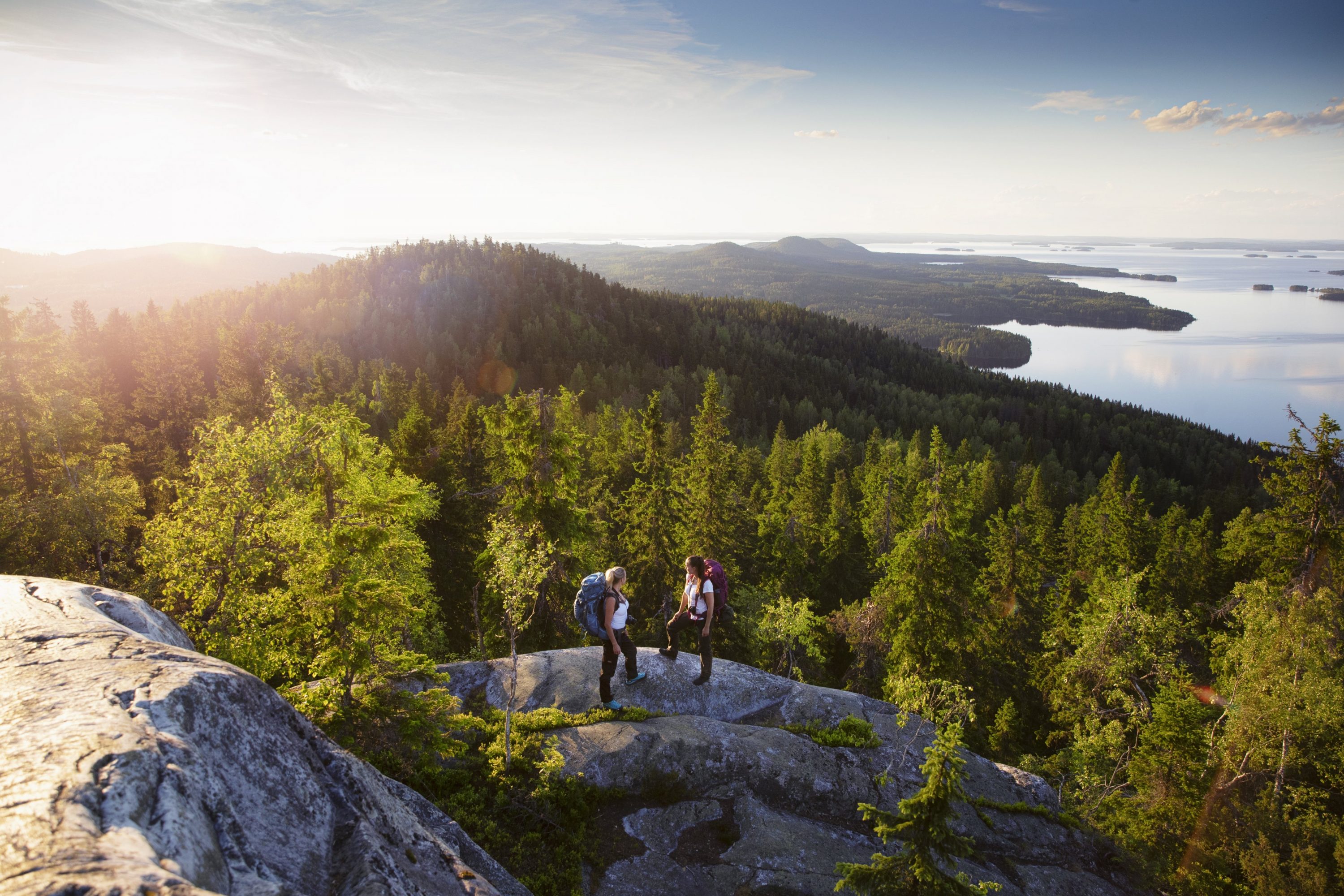 Two hikers on the top of Koli