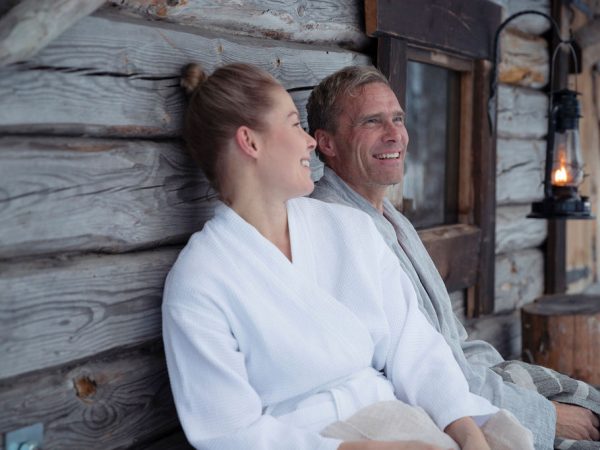 Happy couple in bathropes