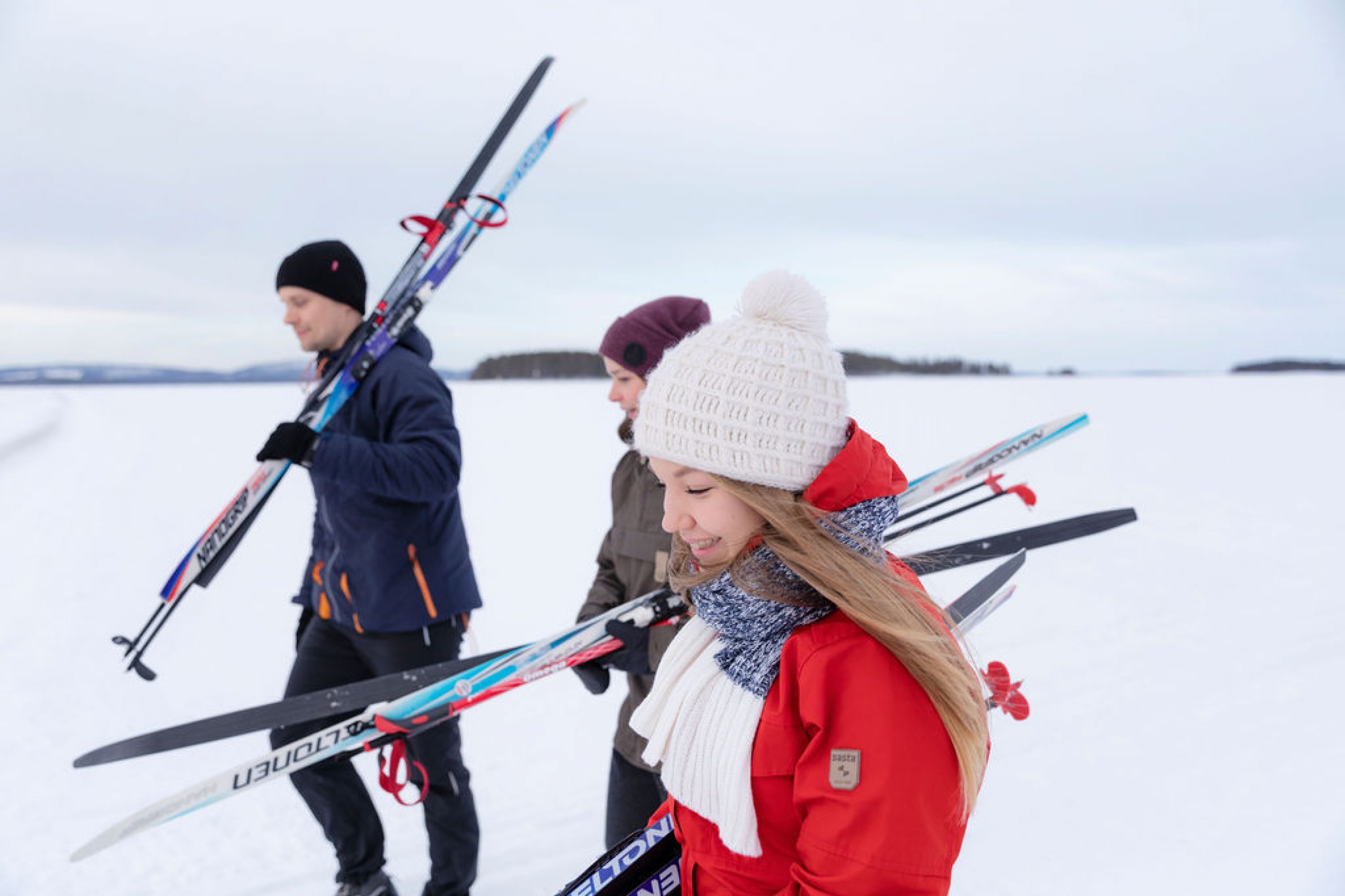 Happy skiiers on the lake