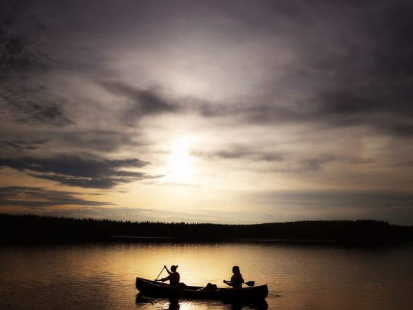 A silhoutte of paddlers