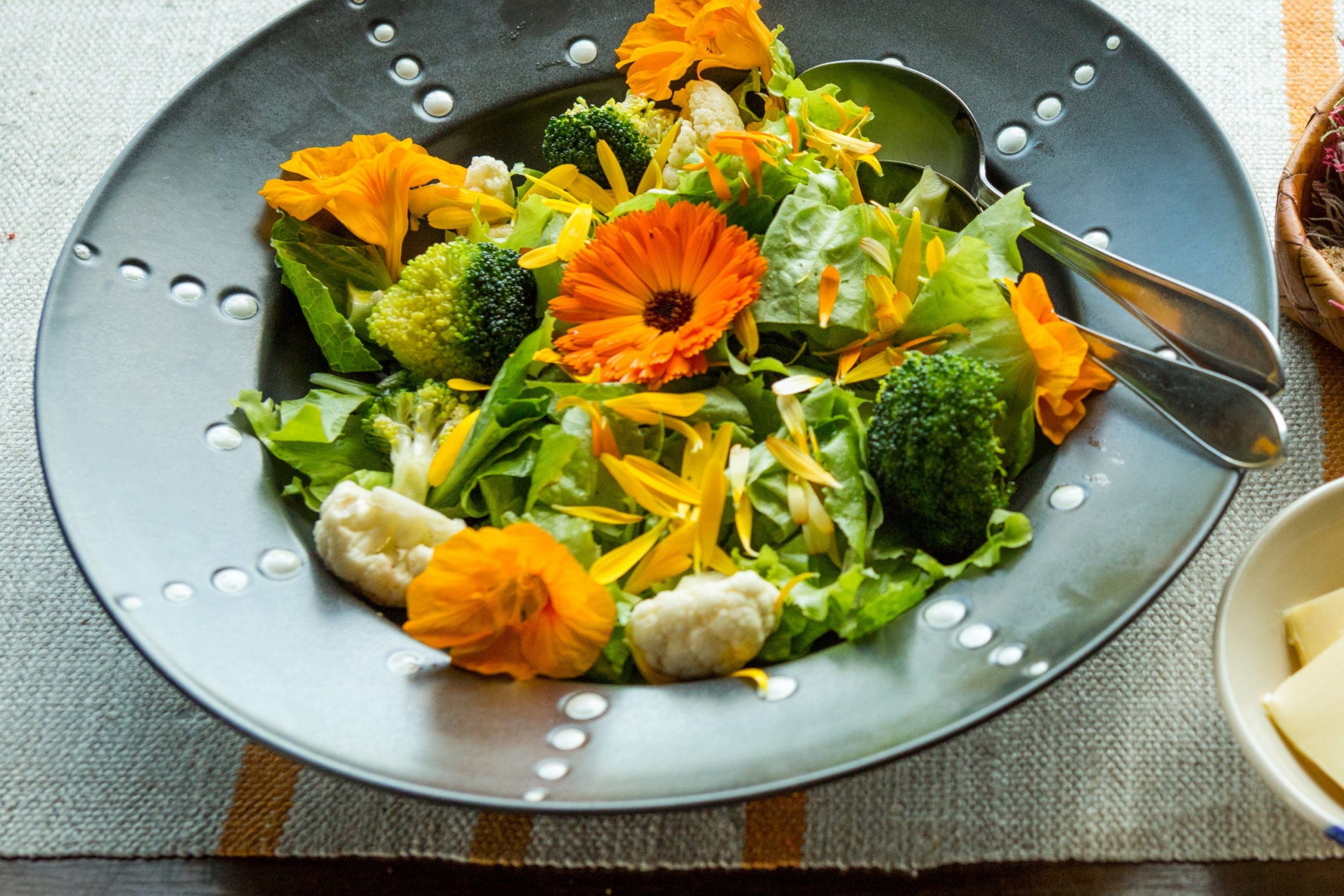 A colorful salad with flowers